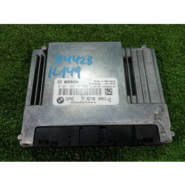 Engine Control Unit (ECU) for BMW 7 Series 2006 E66, N73B60A (6.0L) engine, part number 12147578091. This used ECU is in good working condition, perfect for replacing a malfunctioning unit in your vehicle.