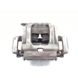 Оригинальный левый суппорт тормоза BMW X5 E70 - оригинал, запчасть.