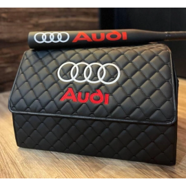 A set in a car black organizer for two compartments with an AUDI bit