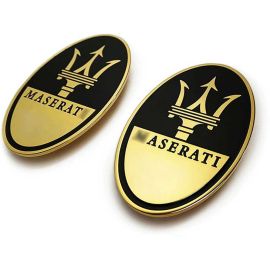 Gold Maserati emblems and floor mats