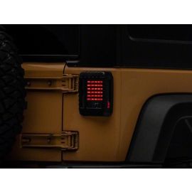 Raxiom 07-18 Jeep Wrangler JK LED Tail Lights- Black Housing (Smoked Lens)